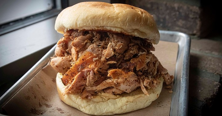 Bear's Smokehouse signature dishes Burnt Ends, Pulled Pork, Pulled Chicken Sandwich, Texas Sausage 